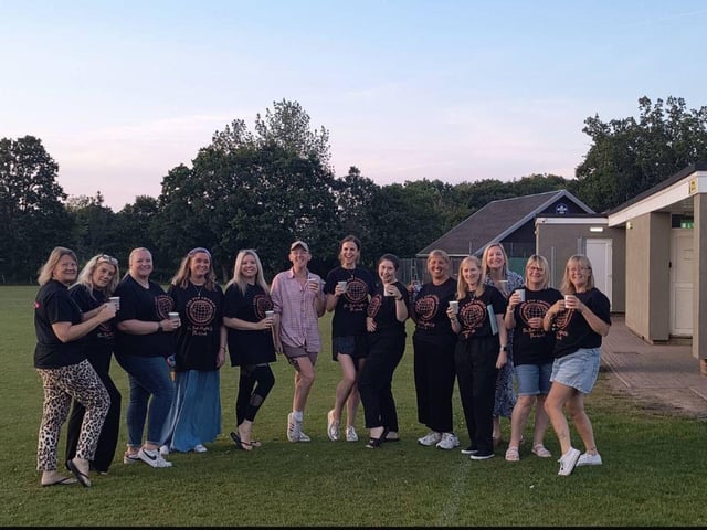 Members of The Pop Chorus with Choirmaster Aled Price