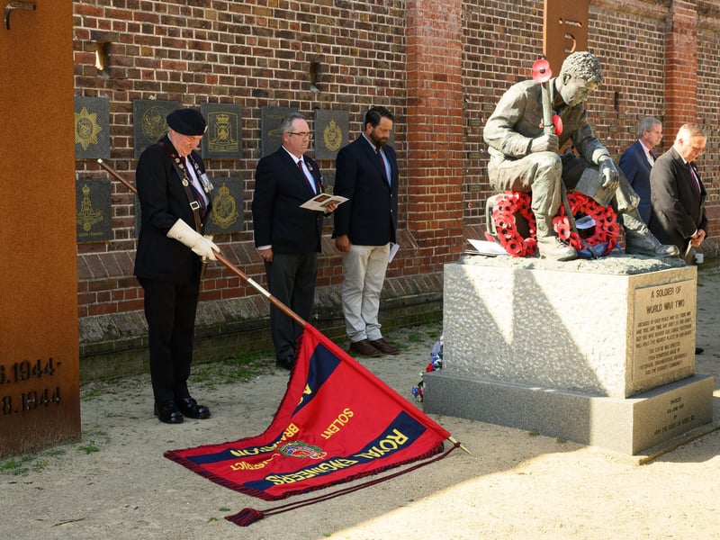 Pictured is: A minute's silence was held for the four men.
Picture: Keith Woodland (090921-33)