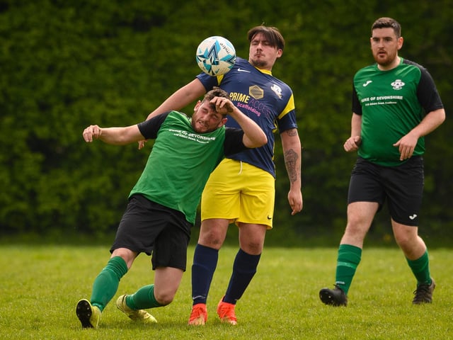 Action from Saturn Royale's 1-0 win over Pelham Arms (blue and yellow kit) in the second Adelaide Cup semi-final. Picture: Keith Woodland (300421-584)