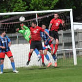 Locks Heath (red) in action during their Hampshire League Cup final loss to Sway last month. Picture by Ian Grainger.