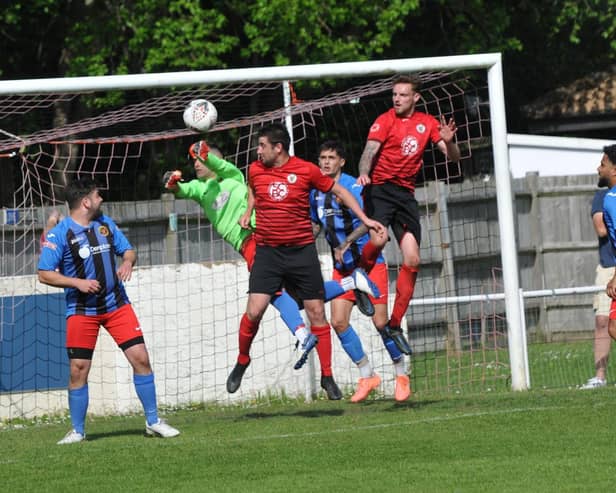 Locks Heath (red) in action during their Hampshire League Cup final loss to Sway last month. Picture by Ian Grainger.