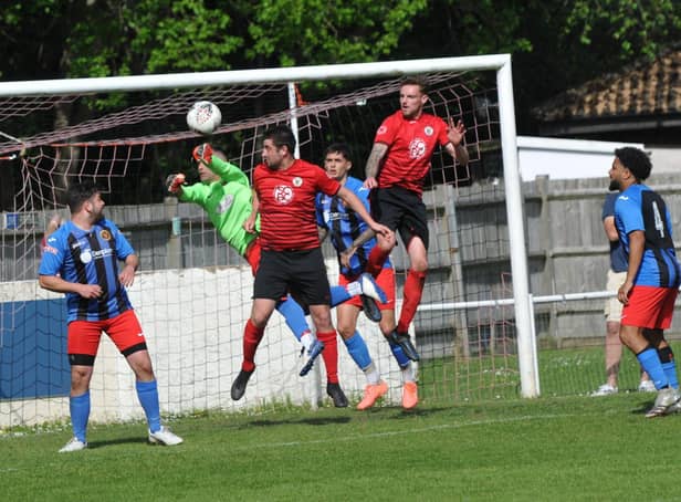 Locks Heath (red) in action during their Hampshire League Cup final loss to Sway last month. Picture by Ian Grainger.