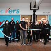 Manager Reece Webber cuts the ribbon, backed by the staff. Opening of Savers, High St, Gosport
Picture: Chris Moorhouse (jpns 180621-01)

