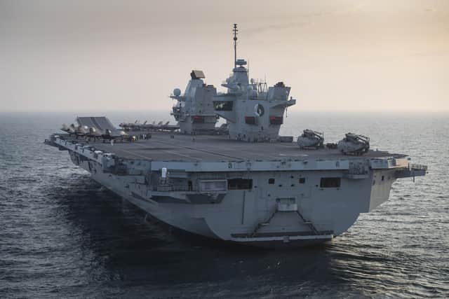 HMS Queen Elizabeth pictured with two embarked squadrons of British and American F-35 jets in North Sea this week. Photo: LPhot Belinda Alker