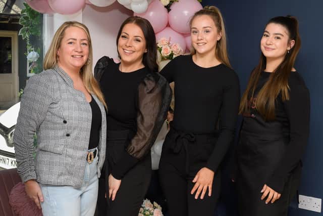 Pictured is: Katrina Othen with her staff, Harriet Craddock, Tilley Coveney, Gemma Dudman.
Picture: Keith Woodland (270221-3)