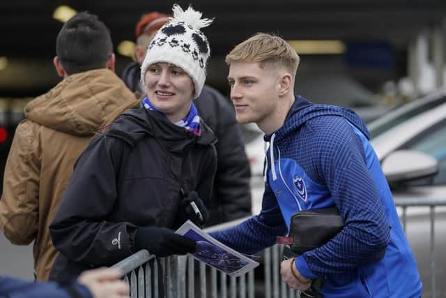 Pompey new-boy Paddy Lane poses for pictures with Blues fans ahead of his Fratton Park debut against Barnsley on Saturday.