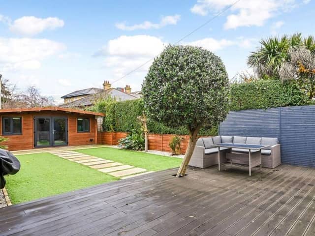 This property comes with three bedrooms, two bathrooms and two reception rooms.