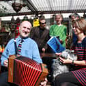 Maggie Sawkins, front right, performing with other members of Tongues and Grooves