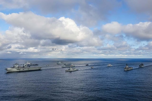 UK Carrier Strike Group with Nato AlliesPictured: (front to back): HMS Prince of Wales. Row 2 (L-R):USS Paul Ignatius, ESPS Almirante Juan de Borbon. Row 3 (L-R): HMS Portland, HNLMS Karel Doorman, HNOMS Magnus Lagabote, RFA Tidespring, HNOMS Olav Tyrggvason, ITS Giuseppe Garibaldi, FS Normandie. Row 4 (L-R): RFA Mounts Bay, HNOMS Otto Sverdrup, HNOMS Gnist, Kv Bjornoya, FGS Bonn with Finnish F18 and Swedish JAS-39 flying overhead