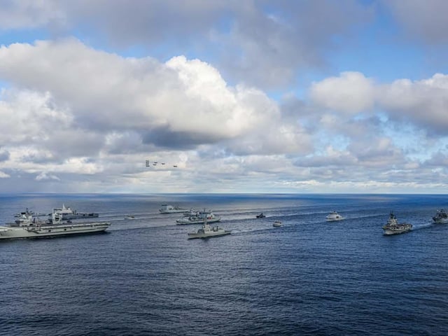 UK Carrier Strike Group with Nato AlliesPictured: (front to back): HMS Prince of Wales. Row 2 (L-R):USS Paul Ignatius, ESPS Almirante Juan de Borbon. Row 3 (L-R): HMS Portland, HNLMS Karel Doorman, HNOMS Magnus Lagabote, RFA Tidespring, HNOMS Olav Tyrggvason, ITS Giuseppe Garibaldi, FS Normandie. Row 4 (L-R): RFA Mounts Bay, HNOMS Otto Sverdrup, HNOMS Gnist, Kv Bjornoya, FGS Bonn with Finnish F18 and Swedish JAS-39 flying overhead