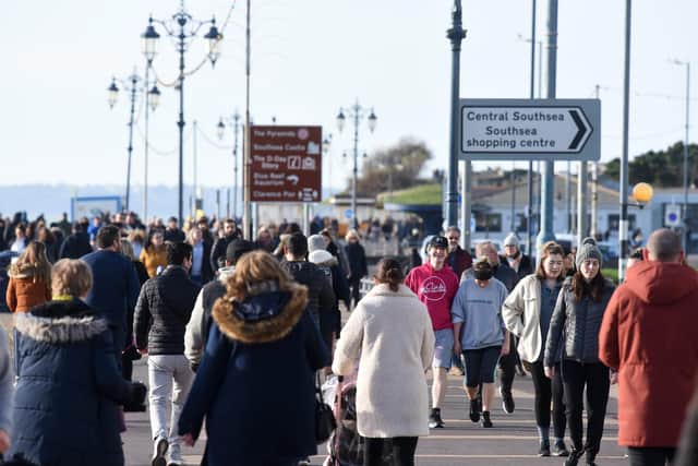 People walking on the seafront at lunchtime on Sunday, January 17 at Southsea. Picture: Simon Czapp/Solent News & Photo Agency