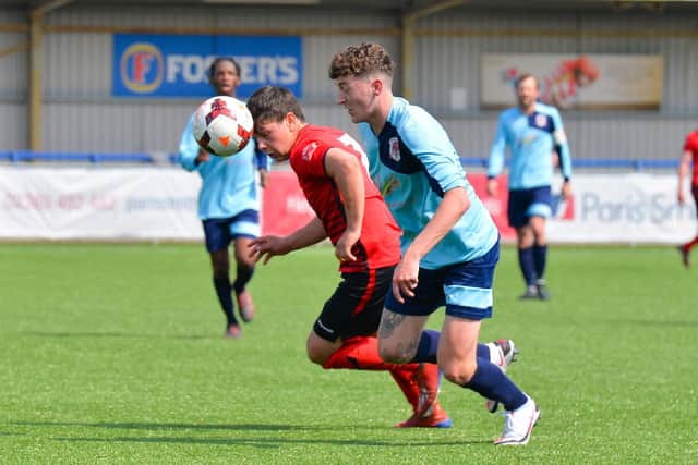Locks Heath's Connor Johnson, left, battles with Bush Hill's Noel McCarthy-Gardiner. Picture: Martyn White.
