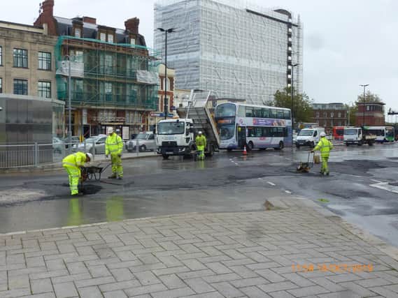 Workers at The Hard Interchange making repairs on October 18 2019. Picture: Terry Pearson