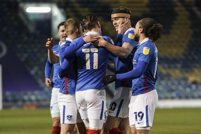 Pompey celebreate Ronan Curtis' opener against Swindon. Picture: Jason Brown