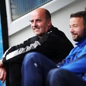 Former Pompey boss Paul Cook sitting alongside Noel Hunt on the Blues bench at Notts County in 2017
