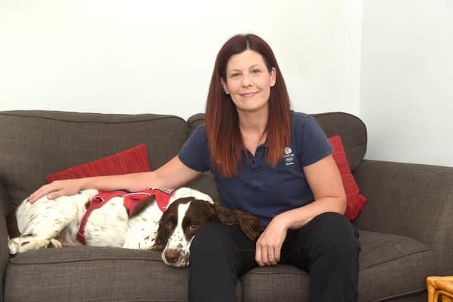 Kerry Snuggs with her Springer Spaniel cross with Bassett Hound Bert (9).
Picture: Sarah Standing (300622-1031)