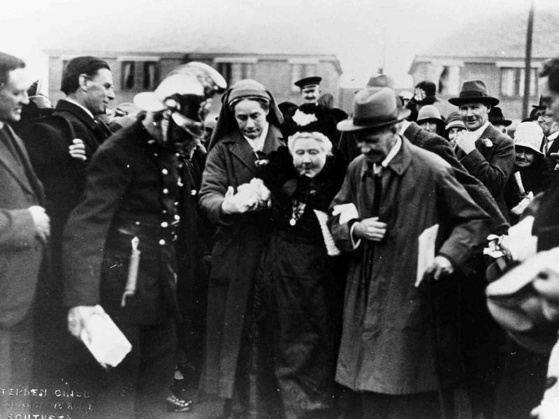 Havant War Memorial Hospital
Miss Bannister, aged 100 years, was the daughter of a well respected local doctor. This view shows her stepping forward to cut the first sod, which signified the start of the building.