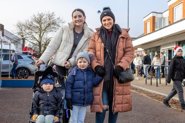 Locals braved the cold to celebrate the start of the Christmas festivites with a street party on Hayling Island on Saturday afternoon.

Pictured - Youngsters Vinnie Hurl, 2, Teddy Hurl, 3 with Nanny Lucy and Auntie Holly, 17.

Photos by Alex Shute