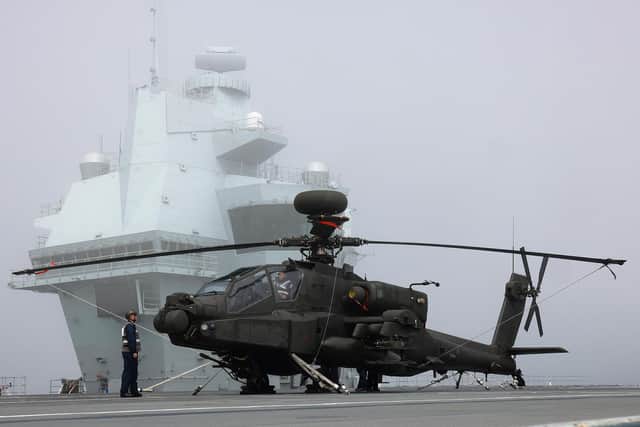 HMS Prince of Wales has headed to sea for a period of testing, following an extended period alongside, conducting maintenance and installing new, cutting-edge capabilities. Pictured is an Apache on her flight deck.