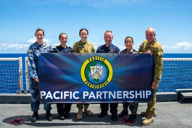 The UK-Aussie team on Mercy with Lt Hailey and Capt Maynard (second and forth on the left).