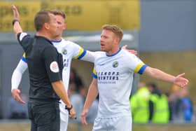 Tommy Wright argues with ref Dean Skipper in the game against Slough last month in which he was eventually sent off. Picture: Martyn White.