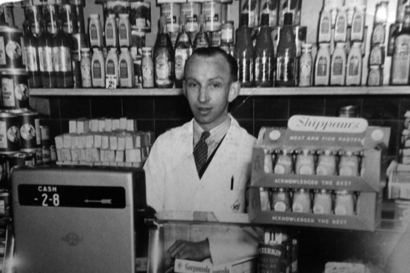 The manager of World Stores in Fratton Road about 1950.