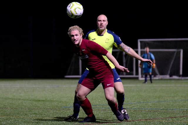 Lee Caldwell keeps a close eye on Strawberry striker Billy Cobb. Picture: Martyn White.