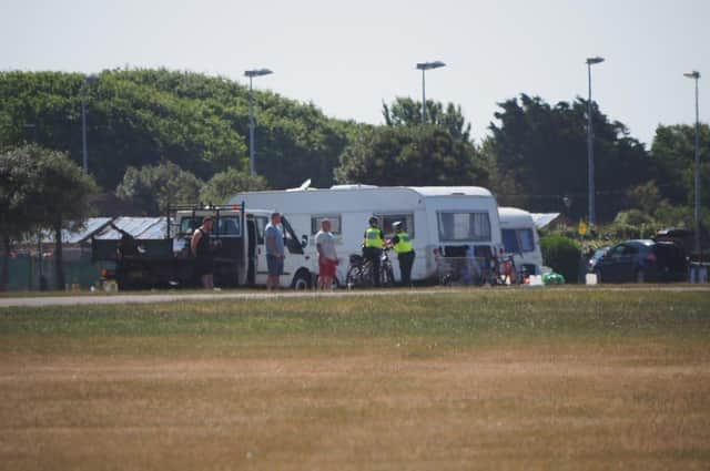 Police approach travellers at Southsea Common on June 23, 2020. Picture: Habibur Rahman