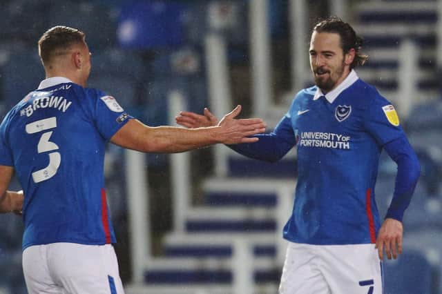 Ryan Williams celebrates his goal against AFC Wimbledon with Lee Brown. Picture: Joe Pepler