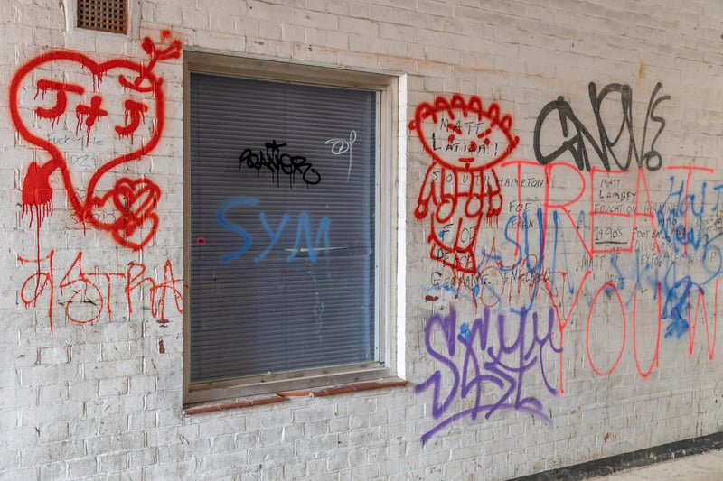 A graffiti-covered alleyway off Arundel Street