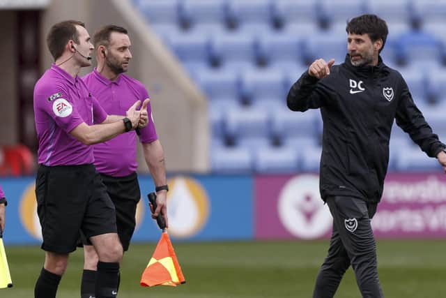 Pompey head coach Danny Cowley speaks to referee Ben Speedie at the final whistle. Picture: Daniel Chesterton