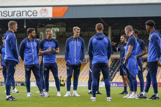 The Pompey players on the Port Vale pitch before kick-off. Picture: Jason Brown