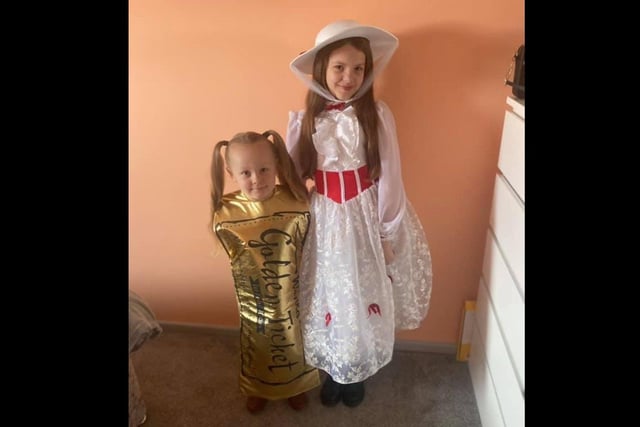 Belle, five, as the Golden Ticket from Charlie and the Chocolate Factory and Tilly, 10, as Mary Poppins