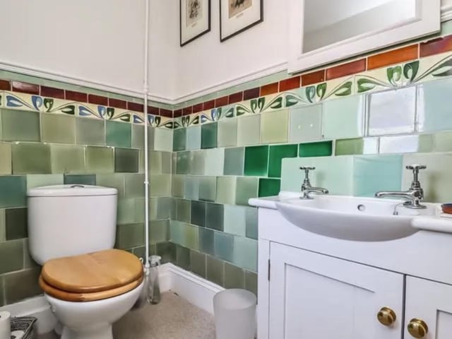 The listing says: "This beautifully presented, much loved family home provides ample living accommodation throughout its four split level floors, maintaining all of its original charm and characteristics, providing picturesque rooms, front and rear gardens and off road parking."