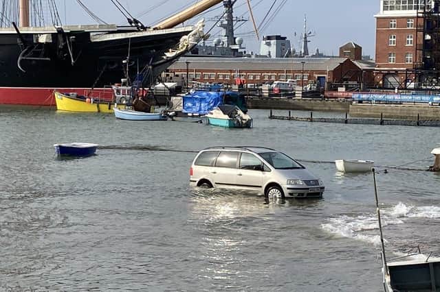 Vokswage Sharan parked on the slipway, between The Hard and Portsmouth Historic Dockyard. Picture: Andy Gibbs