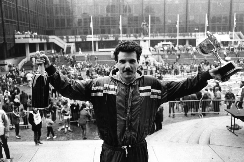 Kevin Jaques celebrating his win at the Portsmouth half marathon, 1987. The News PP4941