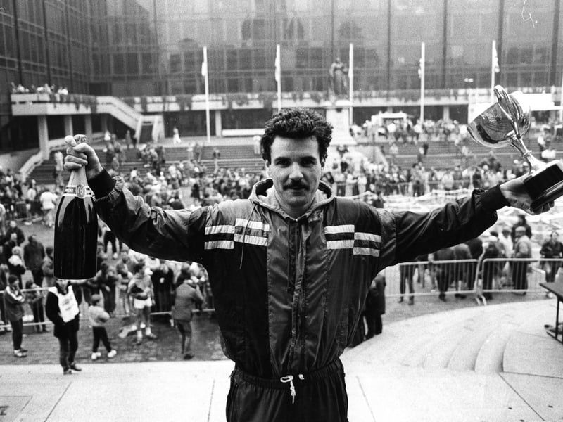 Kevin Jaques celebrating his win at the Portsmouth half marathon, 1987. The News PP4941