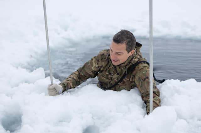 Pictured is Honorary Colonel Bear Grylls OBE conducting  ice breaking drills with the Royal Marines at Skjold training area