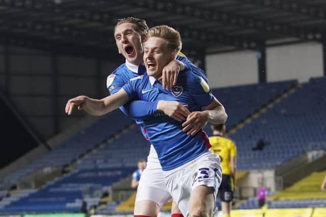 Harvey White celebrates his goal at Oxford with Ronan Curtis. Picture: Jason Brown