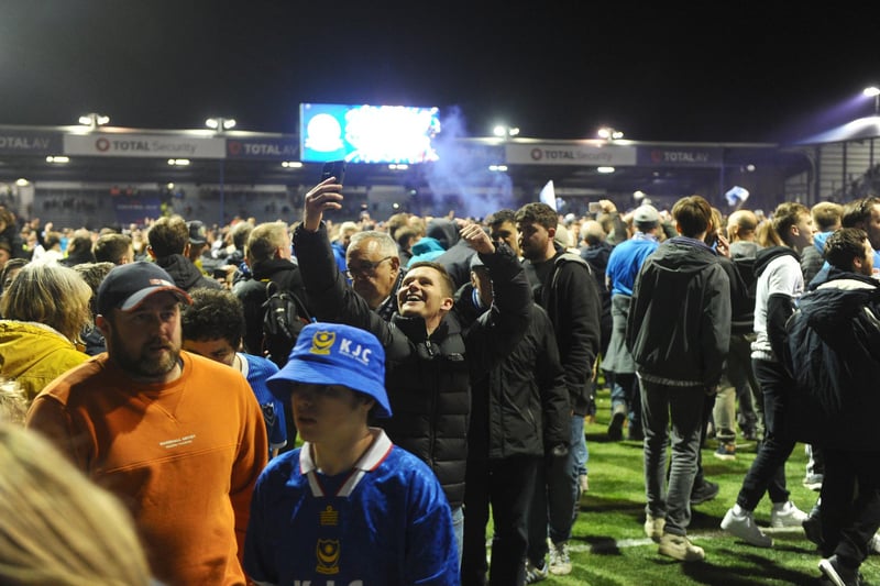 Delighted fans celebrate Pompey's victory at Fratton ParkPicture: Sarah Standing (160424-7758)