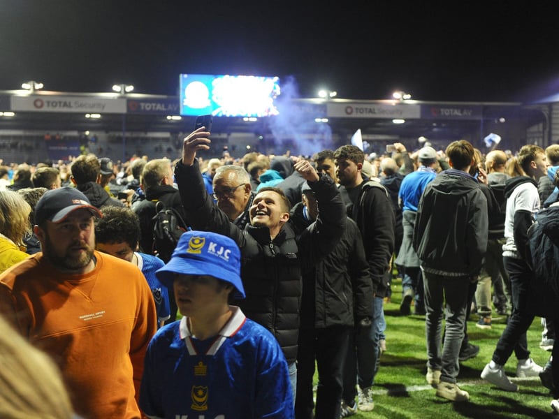 Delighted fans celebrate Pompey's victory at Fratton ParkPicture: Sarah Standing (160424-7758)