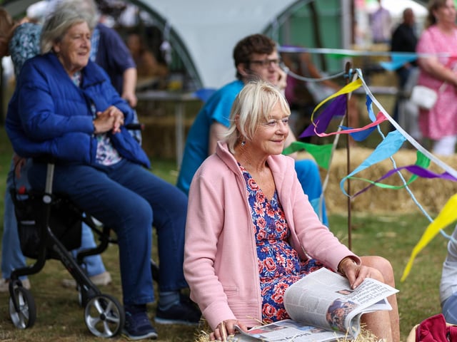 Sue Packham watching a performance by Silly Scott.  Picture: Chris Moorhouse (160825-30)
