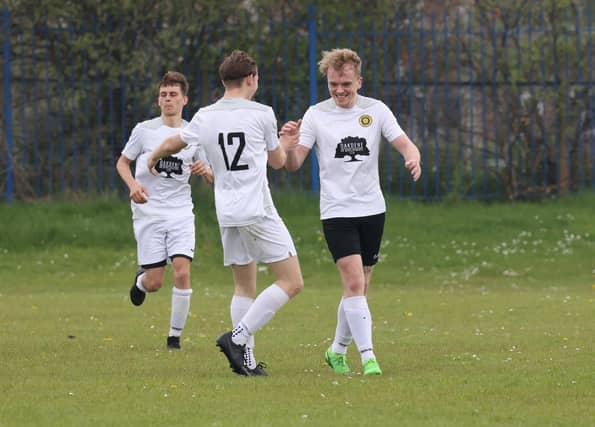 Pompey Chimes celebrate one of their goals in a 6-1 win over Horndean Hawks. Picture: Kevin Shipp