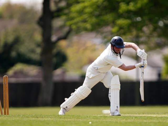 Portsmouth Community's Matt Davies is bowled during his side's win over Hayling Island. Picture: Chris Moorhouse