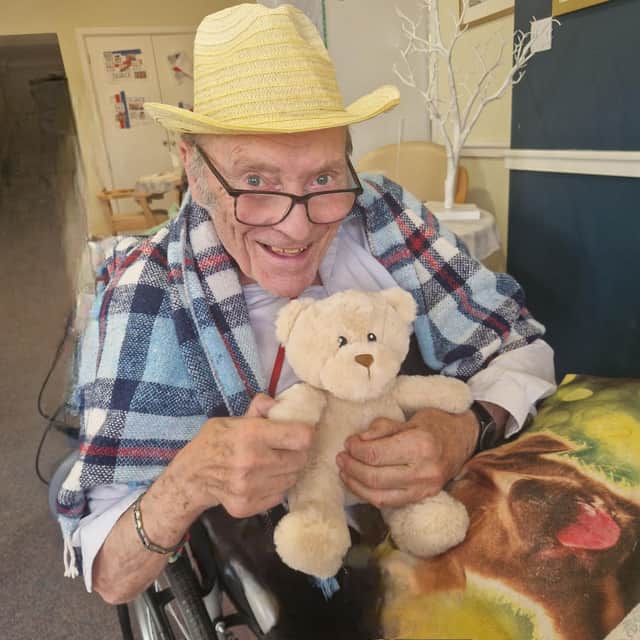 A special moment: Richard with his new teddy bear, gifted to him at Bedhampton Court