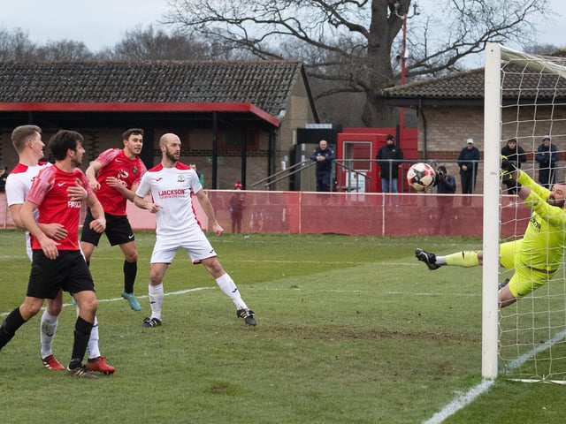 Horndean goalkeeper Cameron Scott pulls off a great save. Picture: Keith Woodland