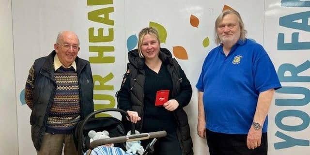 Chloe Young thanks Tesco and the Rotary Club members for their kindness.