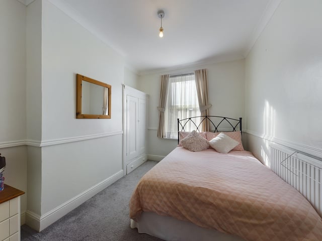 Thie two-bedroom apartment is on the market for £185,000. It is listed by Chinneck Shaw.