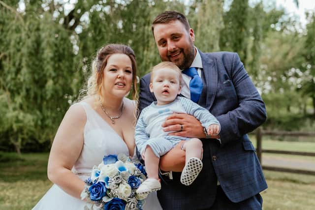 Leah and Aidan Longman with their son Rueben on their wedding day at The Tithe Barn, Petersfield. Picture: Carla Mortimer Photography