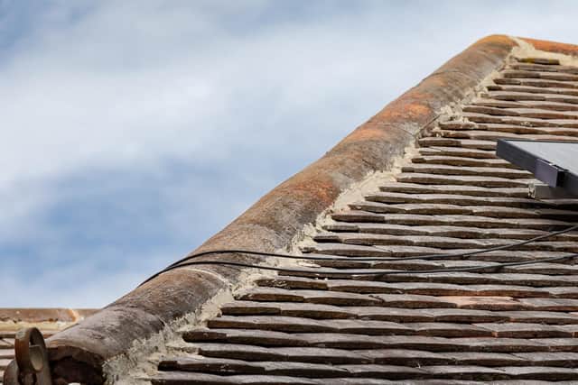Repairs to Tim King's ridge tiles were described by the insurance assesor as 'the worst work he'd ever seen'. Picture: Mike Cooter (151022)